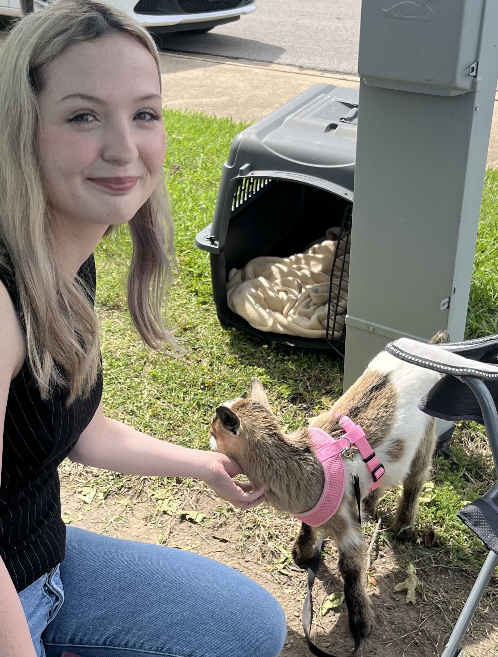 Shaya with a baby goat